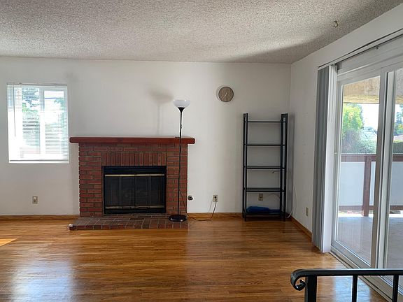 Living room with working fireplace.