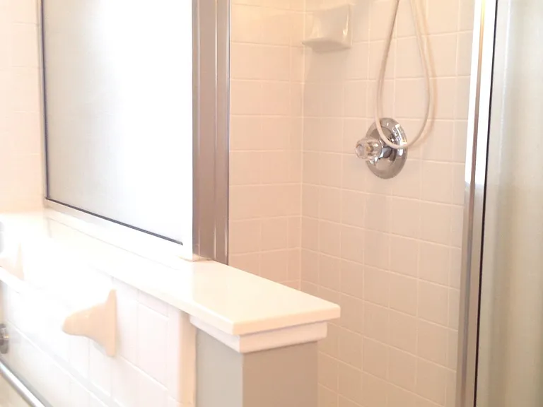 Tiled shower, easy to keep clean.