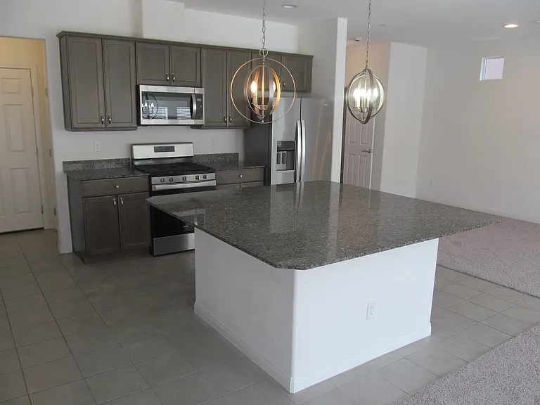 7841 Tyrell Peaks St — Photo 6
