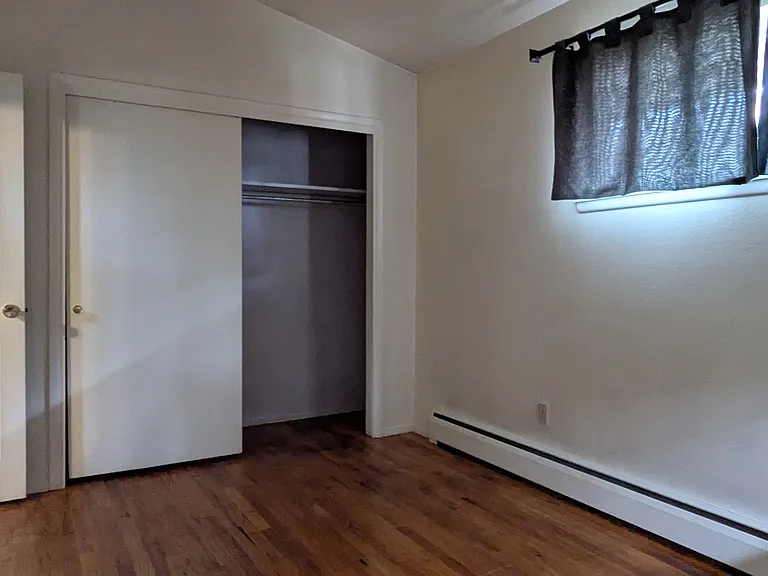 1st Bedroom off of the kitchen area.