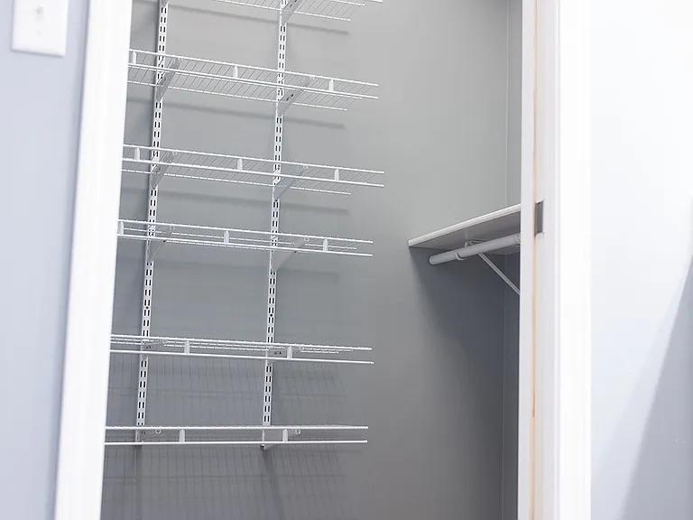 Primary Bedroom walk-in closet