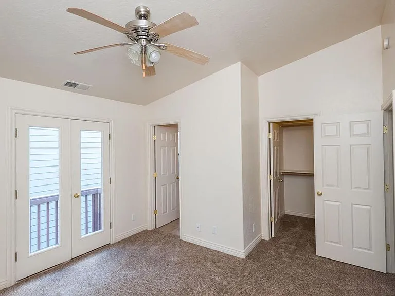 Primary Bedroom with balcony