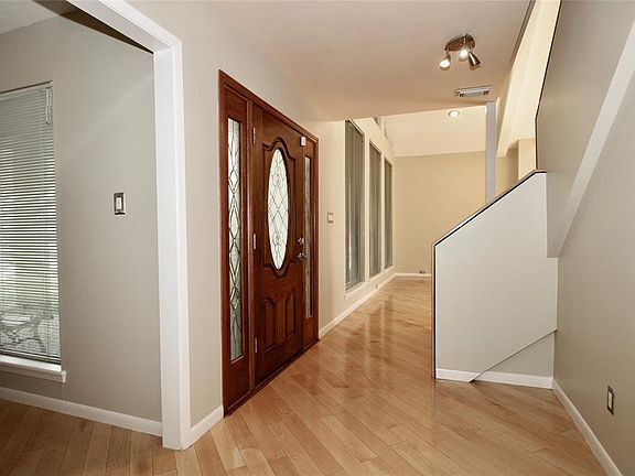 Step inside this immaculate interior to find neutral colors with white trimwork, easy care wood laminate flooring and a wonderful floor plan.