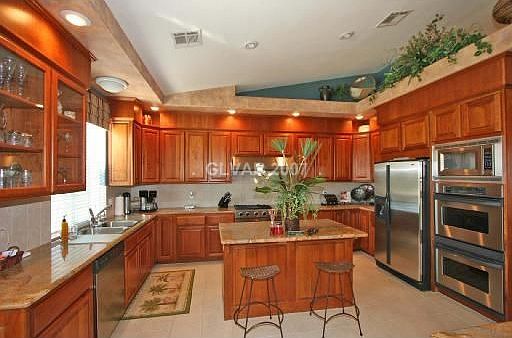 CUSTOM CHERRY WOOD CABINETS THROUGHOUT HOME