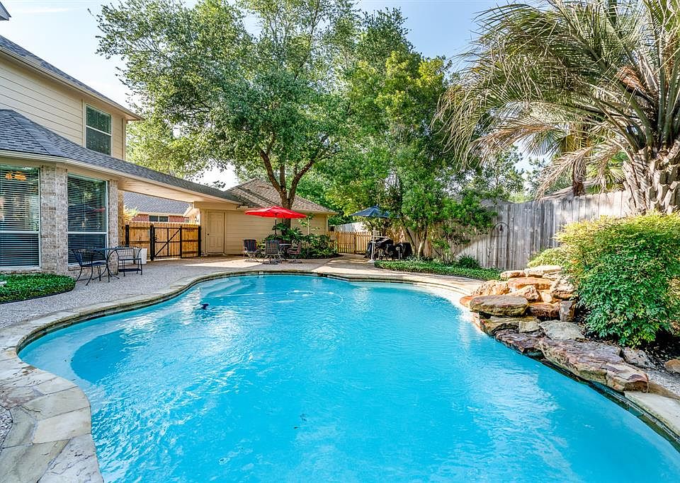 Stay home vacation retreat! Lovely rock fountain ads to the calm, while relaxing in your beautifully shaded and landscaped backyard.
