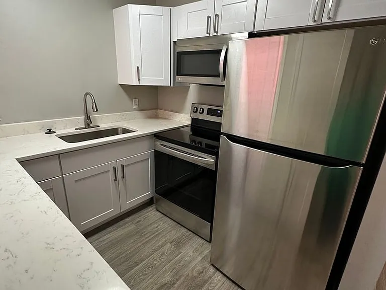 New Brigham Apartments — Photo 34