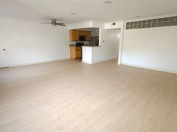 Great flow between living, dining, and kitchen areas _ perfect for entertaining or everyday convenience.