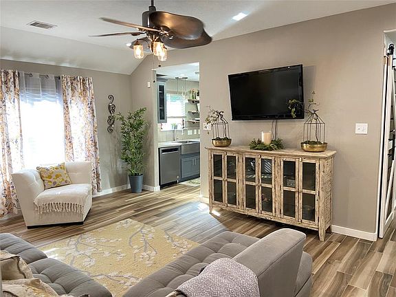 Alternate view of the Family Room toward the Kitchen.