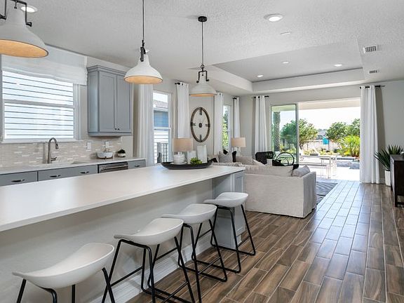 Bright kitchen featuring stainless steel appliances