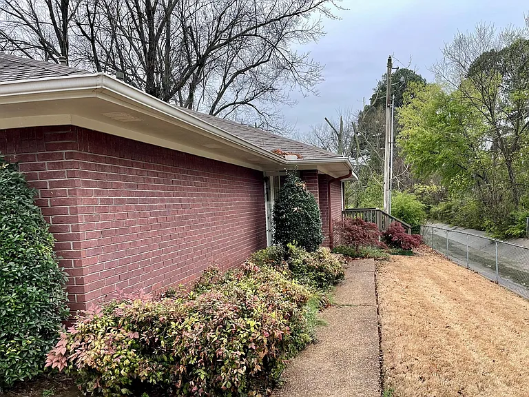 Private, beautifully landscaped entryway.