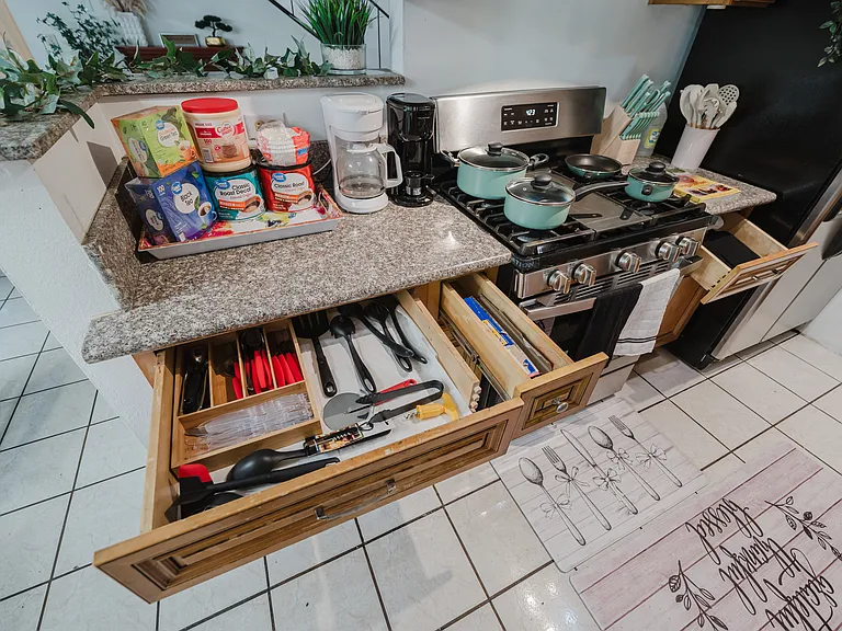 Fully stocked kitchen with all the essentials for home-cooked meals.