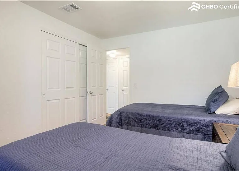Large 2nd bedroom with a great deal of closet