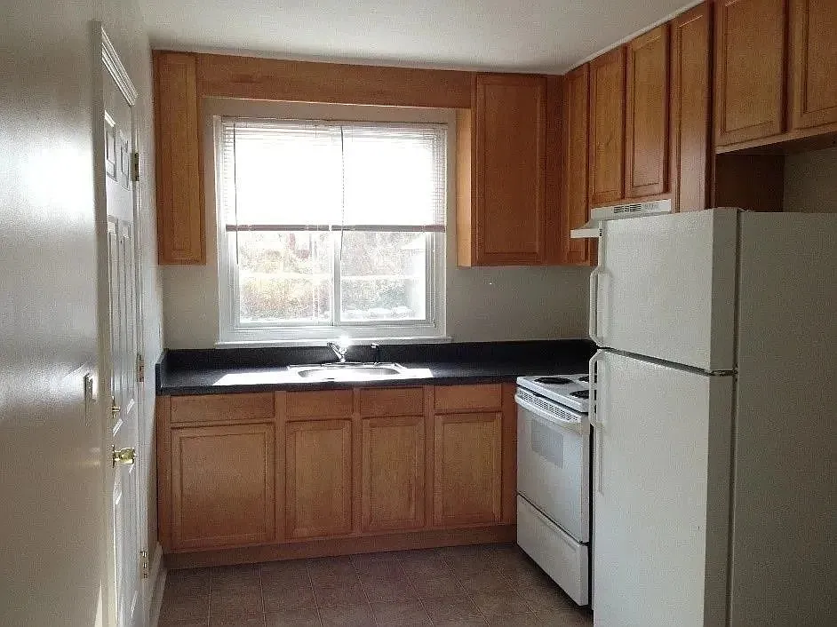 kitchen with stove and refridgerator proviced