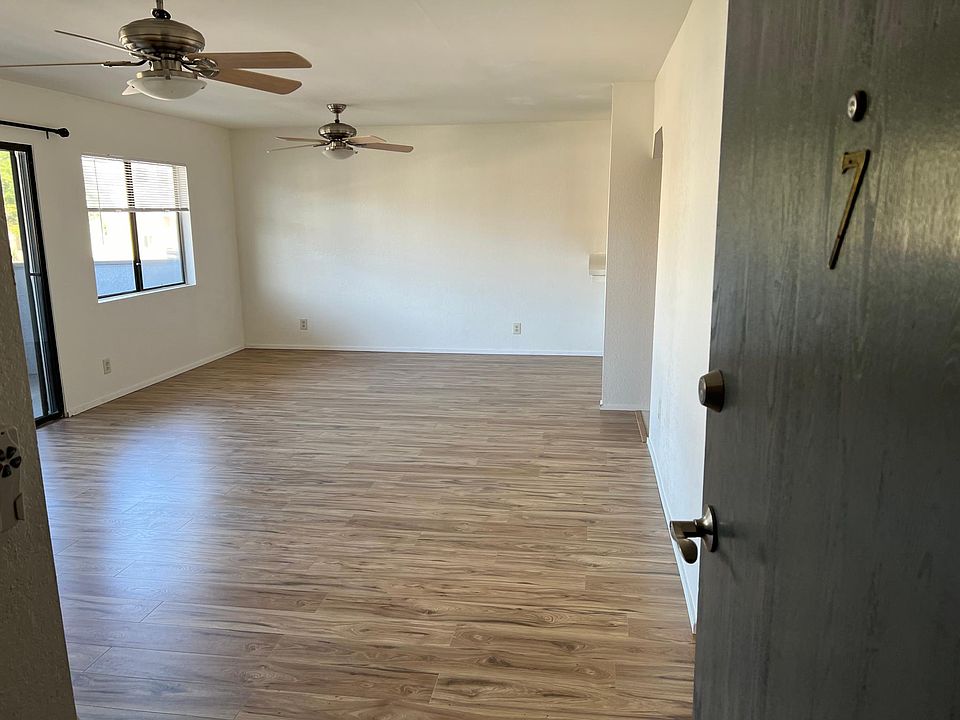 view of living room from front door of unit