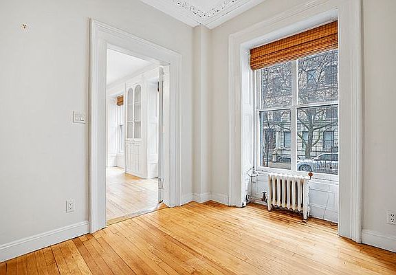 3rd image of 128 E 10th St APT 1