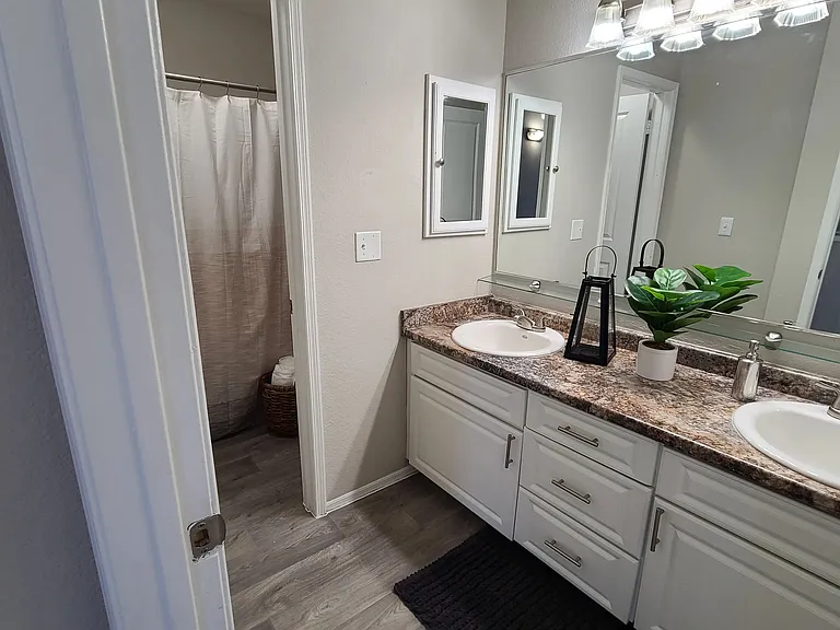 Savor dream bathrooms designed for comfortable living with double sinks and ample storage space.