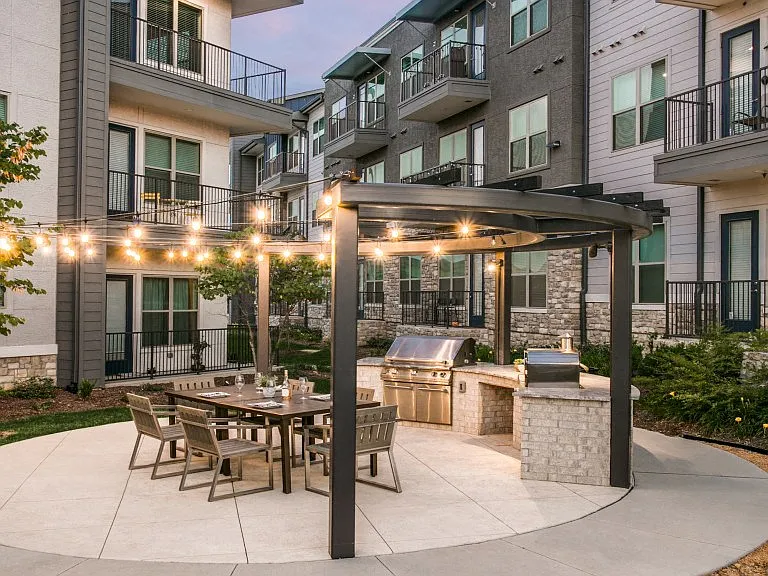 Outdoor dining patio with bistro lighting