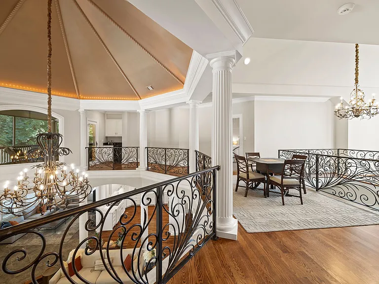 Upstairs Foyer with Game Table off Two Bedrooms with Full Bath on way to Upstairs Screened in Sun Porch