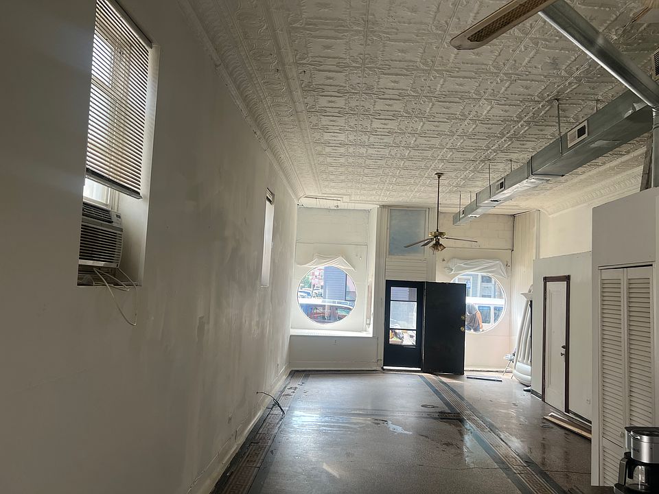 Looking west to front of building.