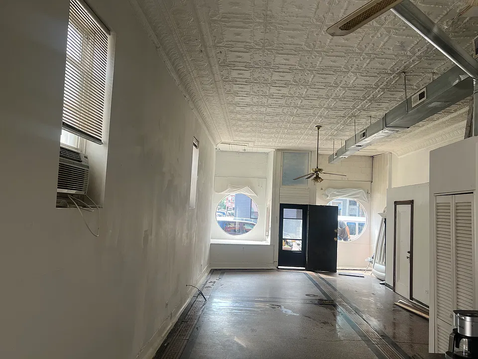 Looking west to front of building.