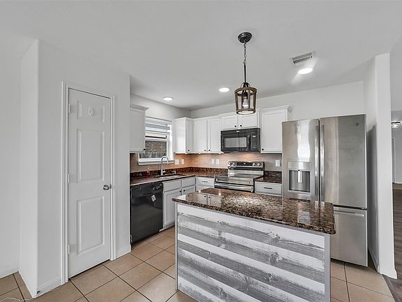 5th image of 6623 Plum Springs Lane