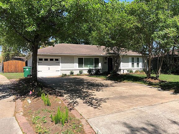 4 parking spaces; side gate