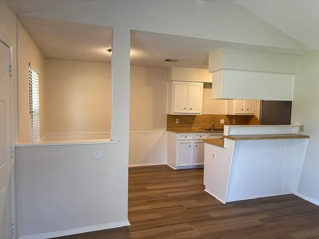 Entry to Dining and Kitchen from Living area.