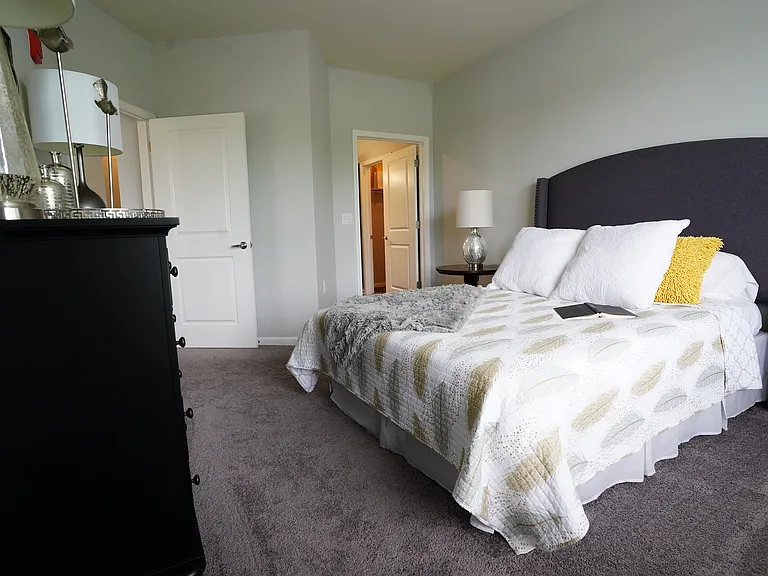 Your primary retreat, complete with calm tones, soft light, and a layout that just makes sense.