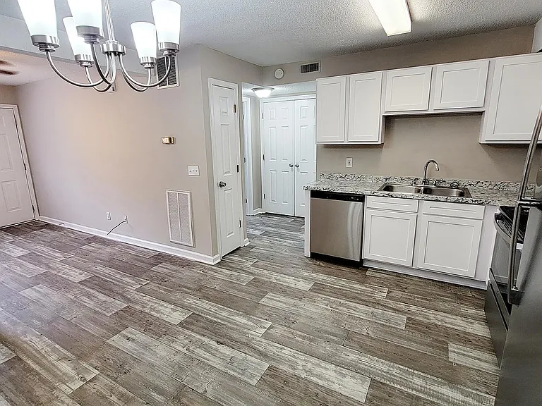 Kitchen with granite counters and stainless appliances