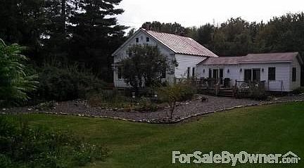 Large yard, stone walk around coi pond