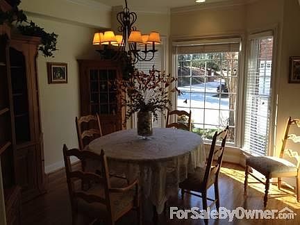 Separate formal dining & living rooms
						:
						Gleaming hardwood floors throughout main; two story entry foyer; trey ceilings