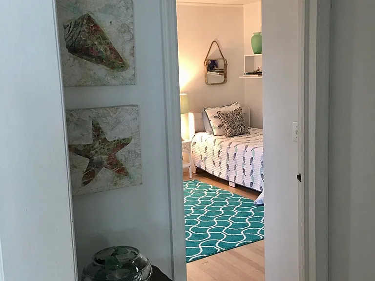 View from hallway off greatroom looking into first of the connected jack & jill bedrooms
