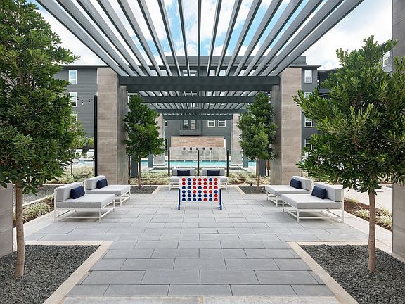 Relax with friends at our pool courtyard with lounge seating.