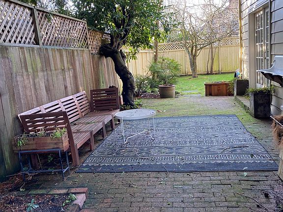 brick courtyard on the south side of the house