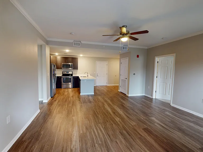 The Hickory features an open-concept layout with a large kitchen and living room. The Hickory features an open-concept layout with a large kitchen and living room.