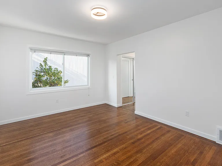 Master bedroom overlooking the backyard