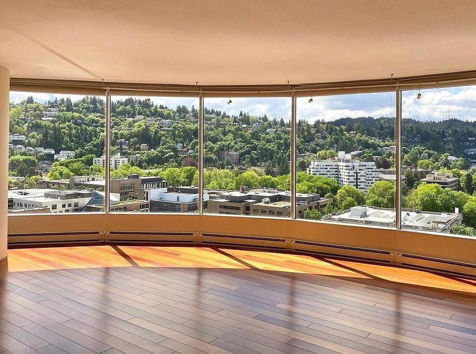 Living room - stunning west hills views through enormous windows (equipped with full coverage shades)