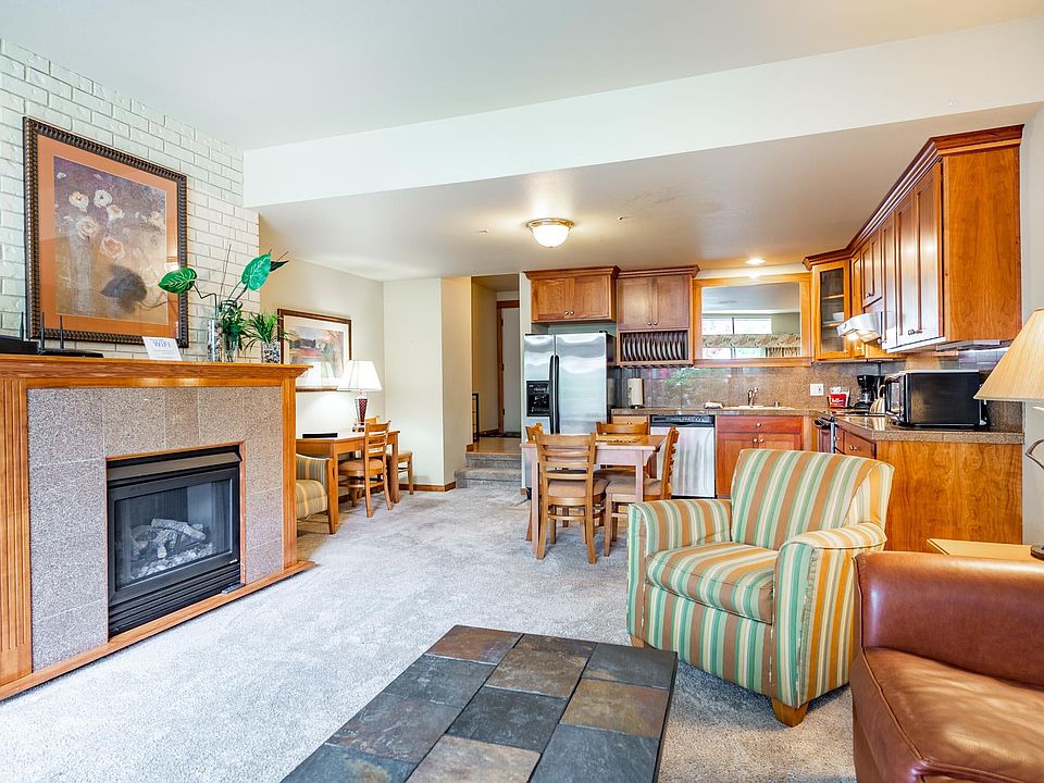 Open area, showing dining, kitchen and living room.