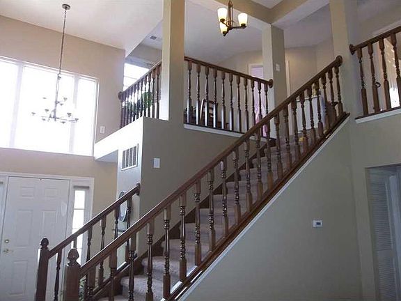 Entry. Large inviting two story entry with windows for bright effect.