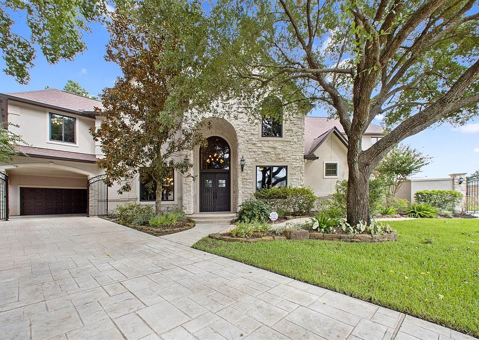 Stunning custom home with stone and stucco exterior, completely renovated, updated and upgraded-Gated 2 car porta-cochere, over-sized 2 car garage. Zoned to Nationally Recognized Klein (KISD)