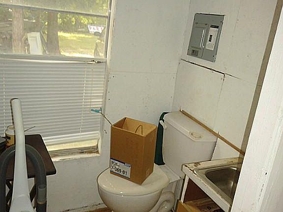 1/2 bath in office building, not plumbed