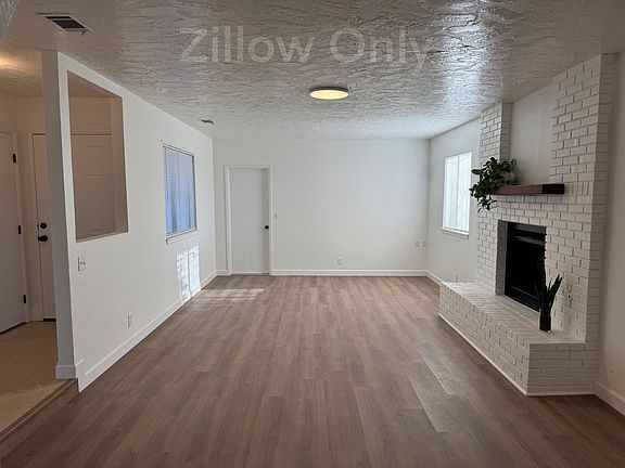 Sunken Living Room with door to Garage