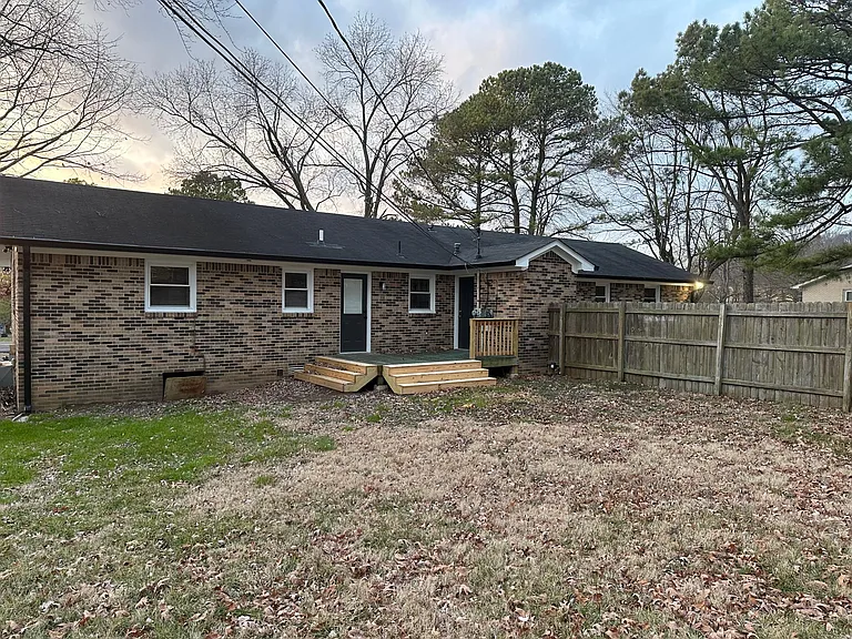 Rear Deck and Fenced backyard.
