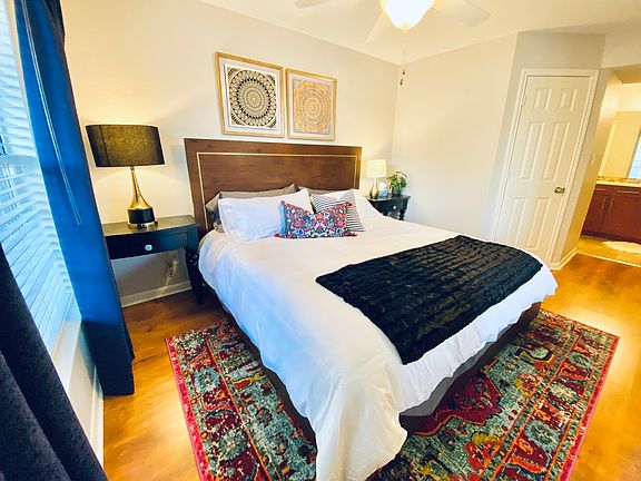 Hotel comparable bed with blackout curtains for a great night's sleep