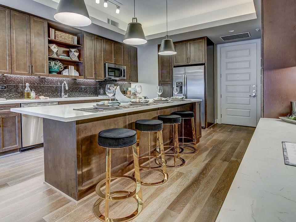 Custom Kitchen with Granite or Quartz Countertops and Designer Tile Backsplashes