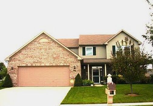 Beautiful lawn and large front porch