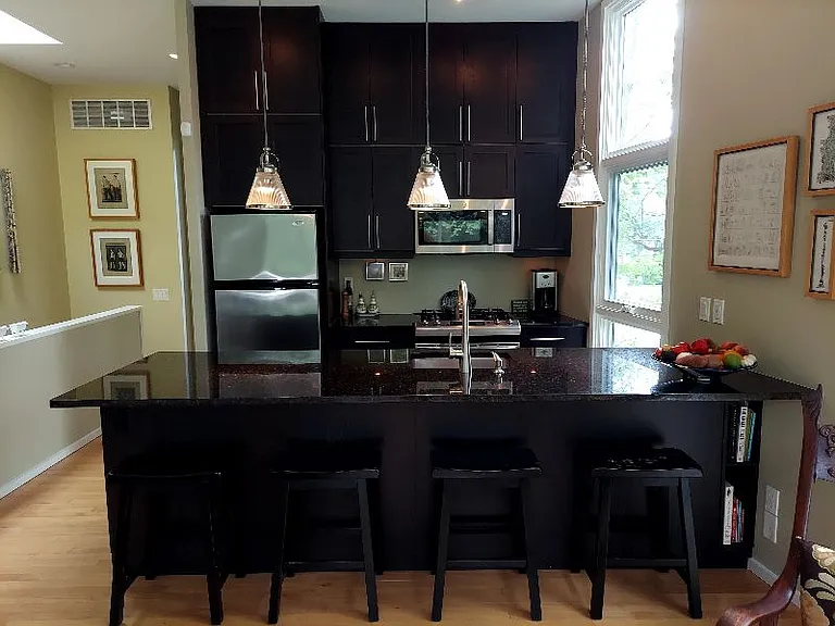 Fully stocked galley kitchen with gas range