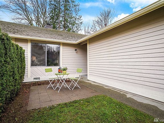 Check out this charming front entrance patio! Space for AM coffee breaks and use for all season evening dinners and barbecues. Build your perfect outdoor patio setting. 