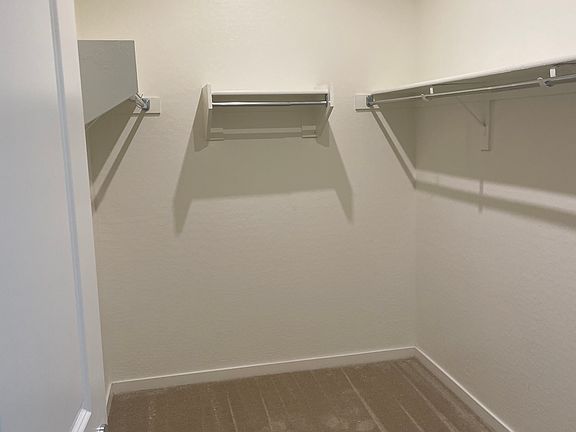 Master bedroom walk in closet.