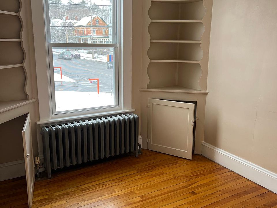 built in display cabinets in eating area/office